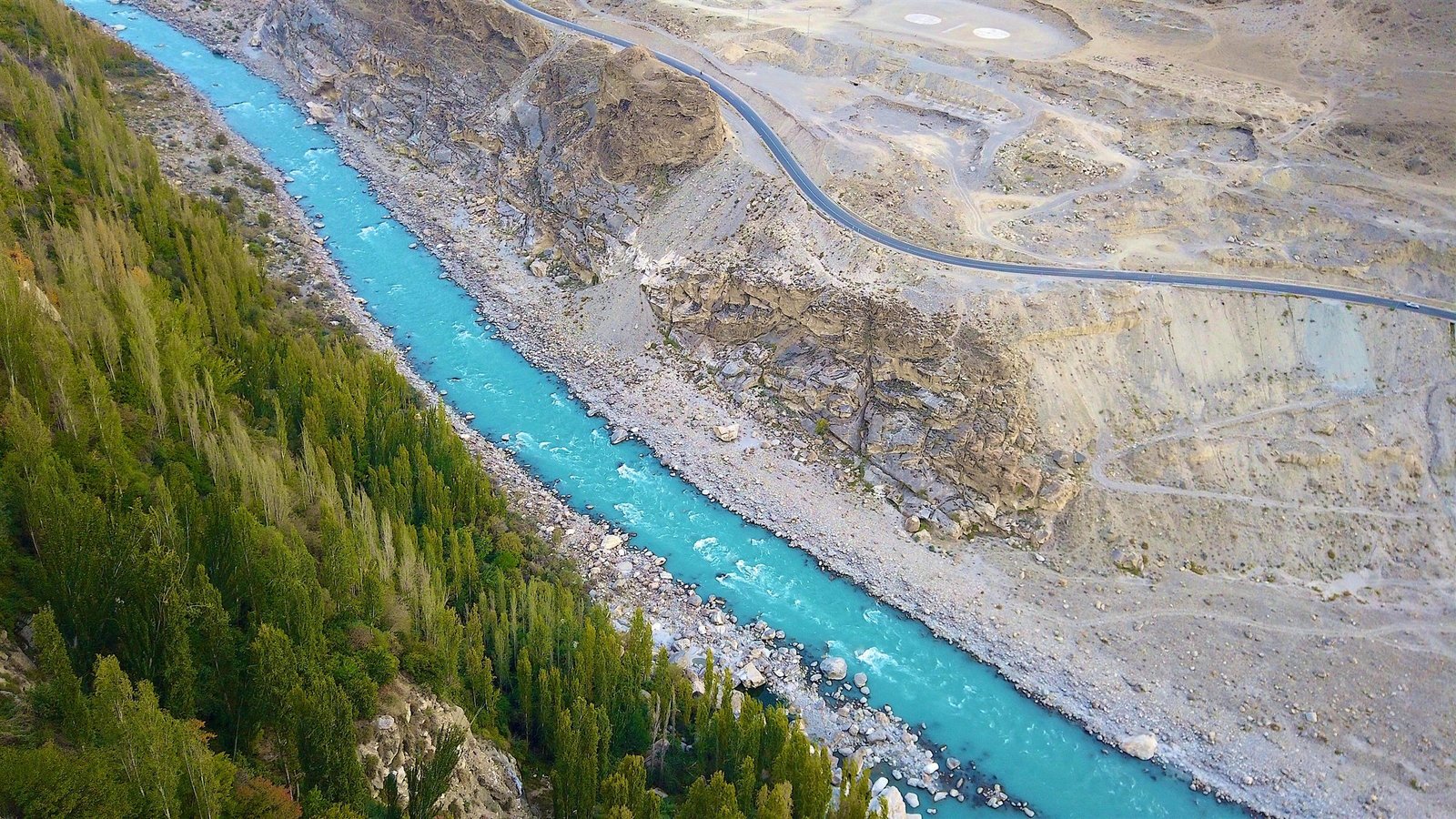 The Karakoram Highway running through a mountain valley