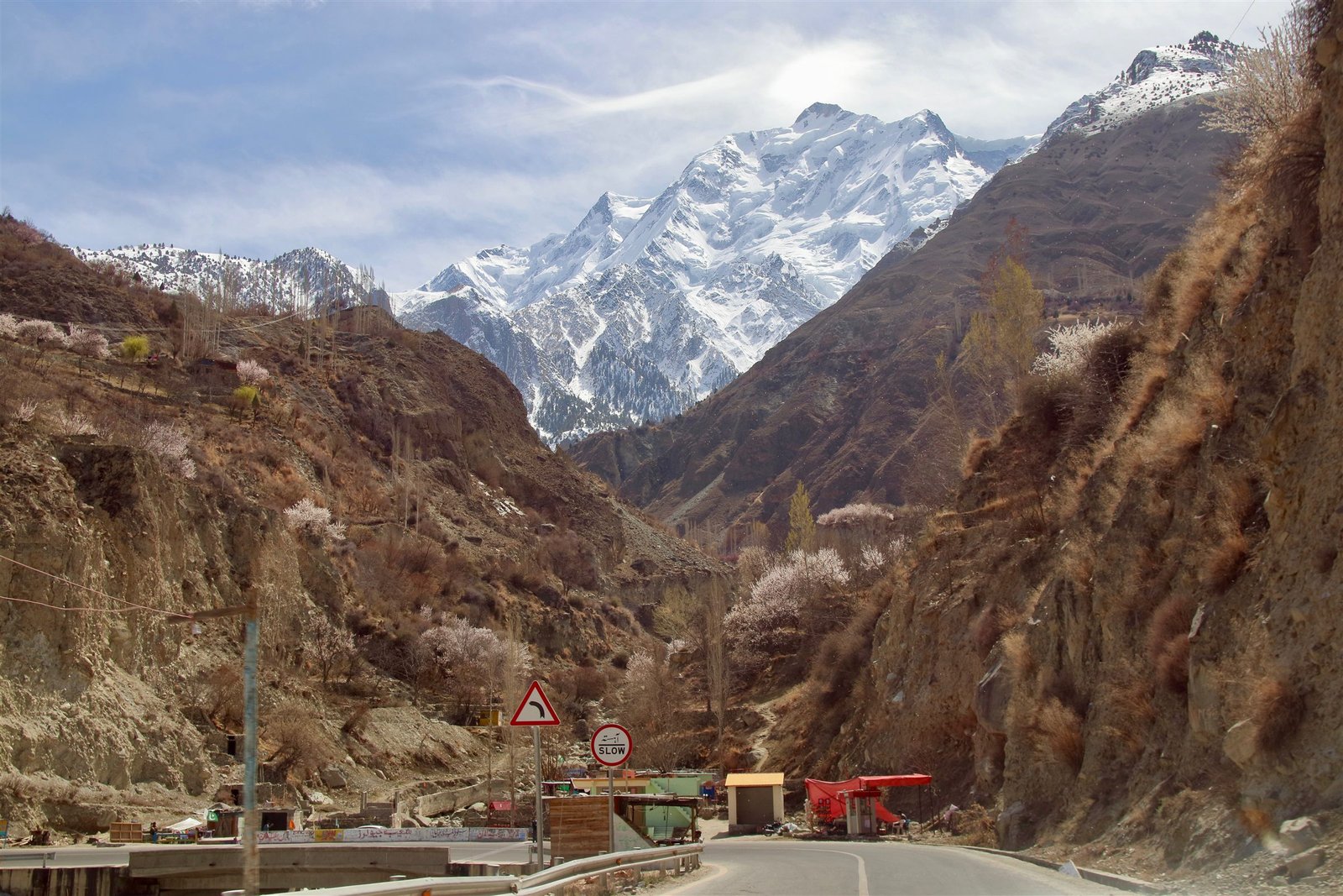 Snow ridges rising above a village valley near Rakaposhi